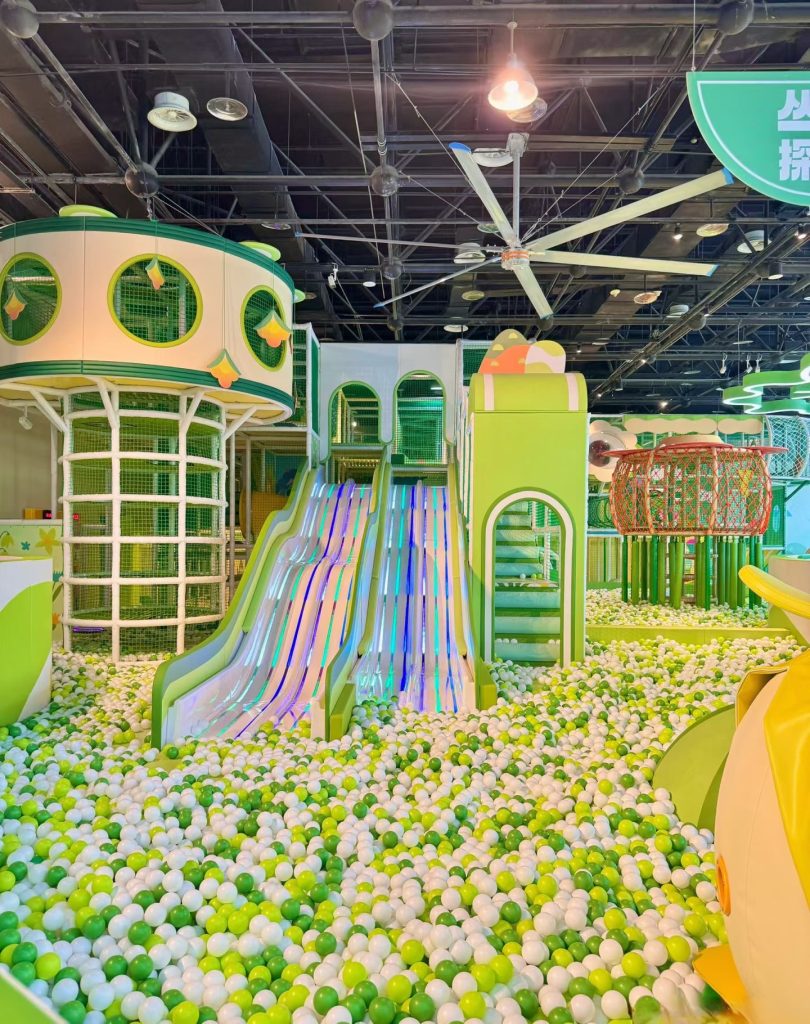 Green multi-slide play zone with ball pool