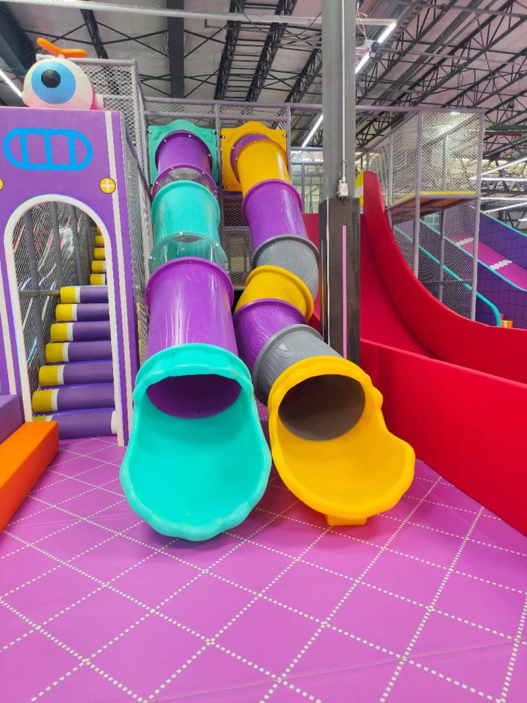 Colorful tube slides for a soft play area